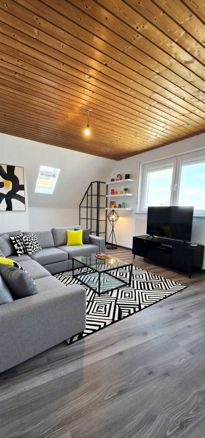 Wohnzimmer und Küchenbereich DG - (KI generiert)